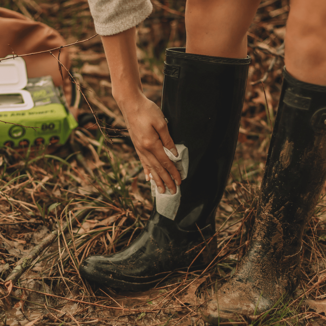 Crocodile Cloth cleaning muddy rubber boots.